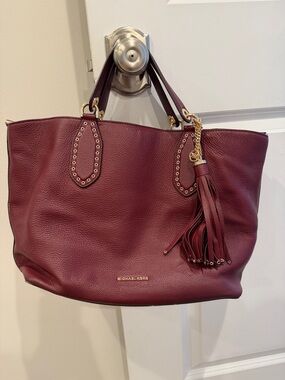 Michael Kors Plum Leather Tote with Tassel and Gold Hardware
